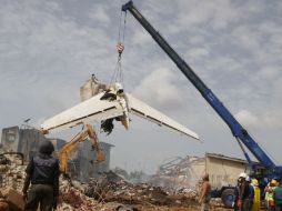 El avión se estrelló en el barrio de Iju, en el norte de la ciudad, cerca del aeropuerto internacional.AP  /