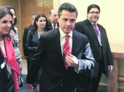 ARRIBO. Enrique Peña Nieto llega al Encuentro Ciudadano con los candidatos. REUTERS  /