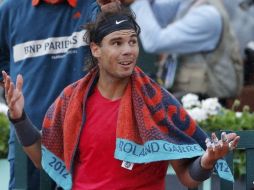 Nadal reacciona ante la ventaja en el marcador. REUTERS  /