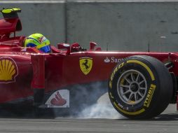 Imagen de Felipe Massa, piloto de Ferrari, en la carrera del pasado fin de semana. ARCHIVO  /