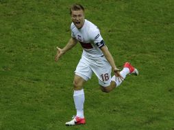 Blaszczykowski celebra el gol del empate de Polonia ante Rusia. AP  /