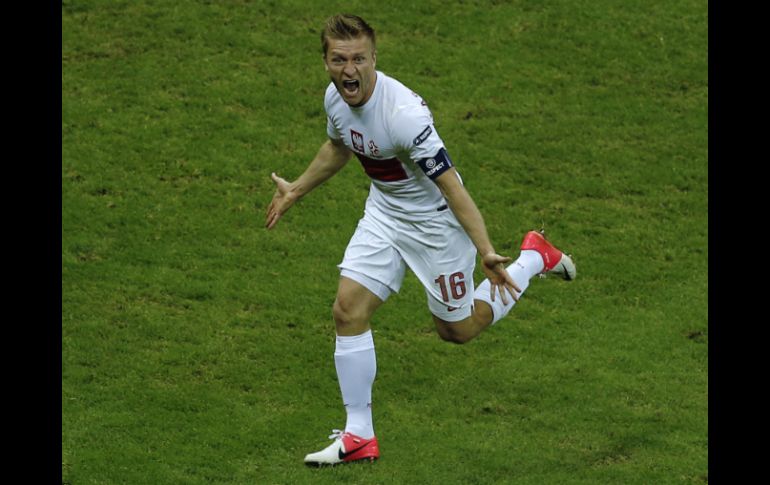 Blaszczykowski celebra el gol del empate de Polonia ante Rusia. AP  /