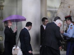 Bernard (d) and Charlotte (i) Cassez llegan al Elíseo para reunirse con el presidente francés. AFP  /