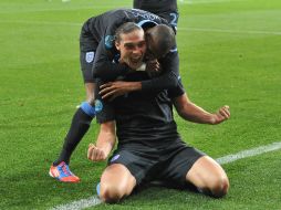 Andy Carroll celebra su gol, el primero de Inglaterra ante Suecia. AFP  /