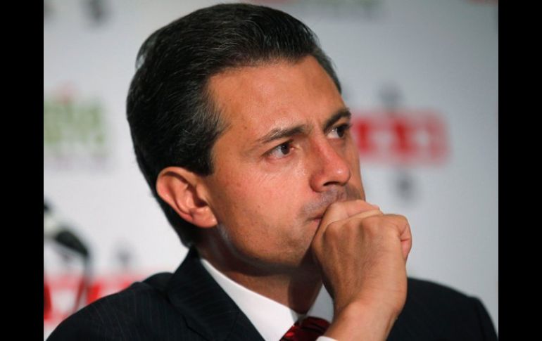 Peña Nieto dice que el México democrático no debe permitir ser rehén del crimen organizado. ARCHIVO  /