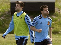 Gerard Piqué y Césc Fábregas, jugadores del FC Barcelona, se preparan para el duelo definitivo de la fase de grupos contra Croacia. EFE  /