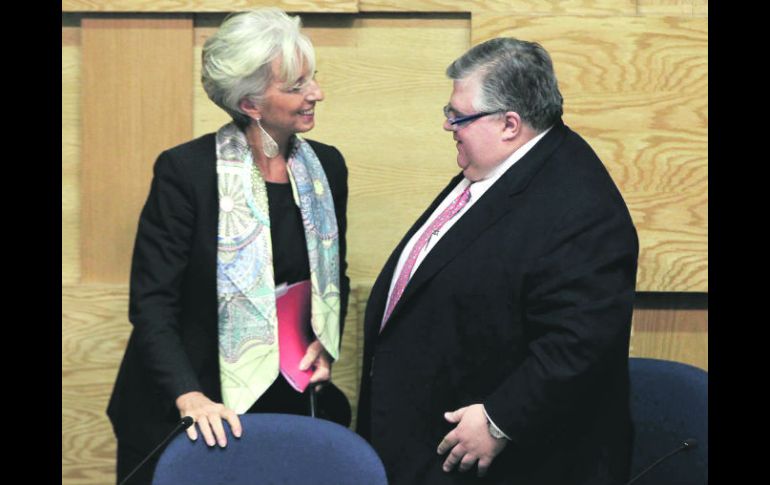 Christine Lagarde y Agustín Carstens.- Como parte de los acuerdo del G-20, México participará en el esfuerzo para fortalecer al FMI.EFE  /