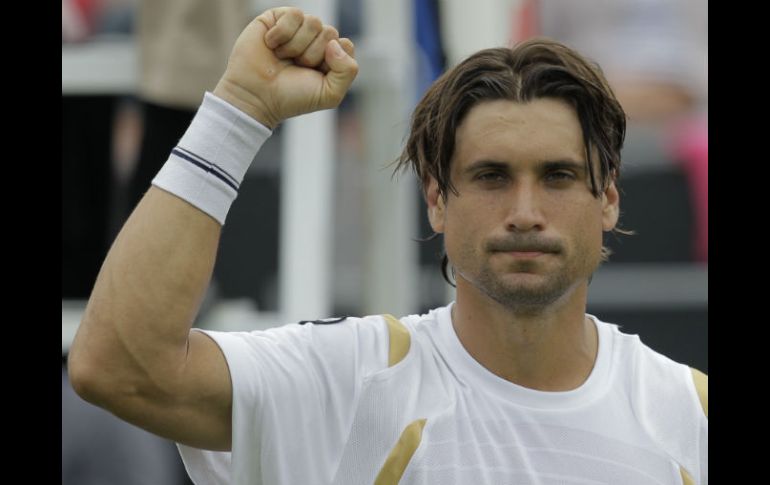 El tenista español David Ferrer celebra tras derrotar al holandés Igor Sijsling. EFE  /