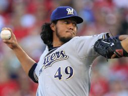 Yovani Gallardo cayó con su equipo Cerveceros de Milwaukee por 3-1 ante Rojos de Cincinnati. AP  /