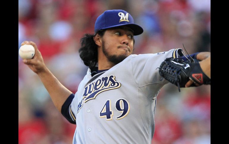 Yovani Gallardo cayó con su equipo Cerveceros de Milwaukee por 3-1 ante Rojos de Cincinnati. AP  /