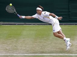 David Ferrer se clasificó para la tercera ronda del torneo de Wimbledon al derrotar al francés Kenny De Schepper. AP  /