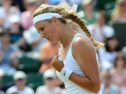 Azarenka celebra tras derrotar a la eslovaca Jana Cepelova en tan sólo en una hora y 14 minutos. AFP  /