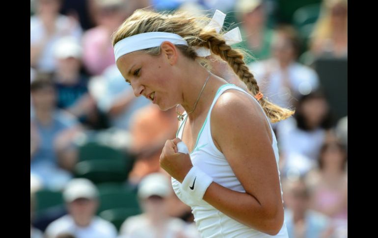 Azarenka celebra tras derrotar a la eslovaca Jana Cepelova en tan sólo en una hora y 14 minutos. AFP  /