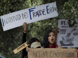 A Peña Nieto le espera una larga lucha por demostrar su legitimidad, dice el New York Times. AP  /