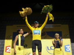 El ciclista del equipo Sky se mostró hoy feliz con el triunfo y aseguró que la fuerza le viene 'de la pasión por la bici'. AFP  /