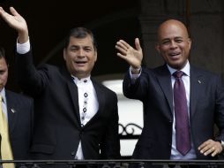 Rafael Correa, durante una visita de su par caribeño, Michel Martelly. AP  /