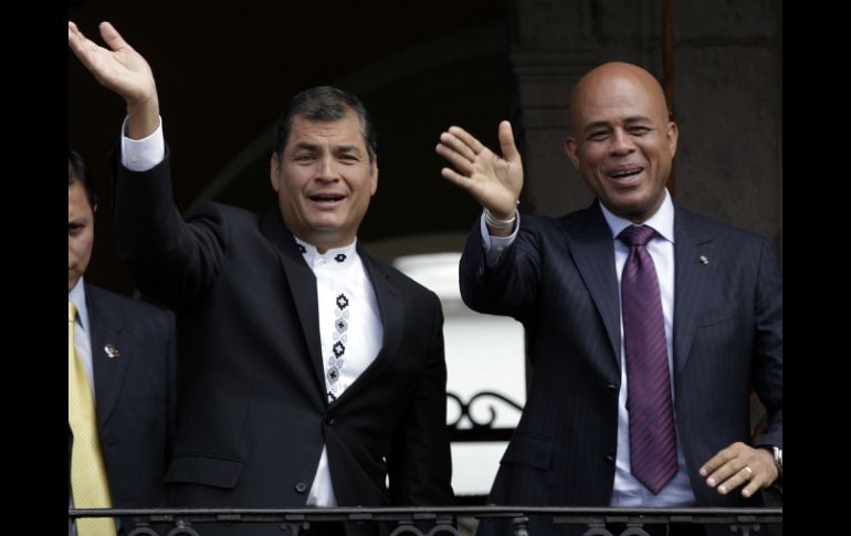 Rafael Correa, durante una visita de su par caribeño, Michel Martelly. AP  /