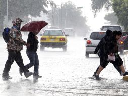 La temporada de huracanes causa intensas lluvias en las ciudades del Pacífico mexicano. EFE  /