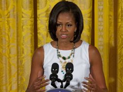 Michelle Obama considera “importante” la reelección de sus esposo Barack, de quien asegura, dará prioridad al tema de la migración. AFP  /