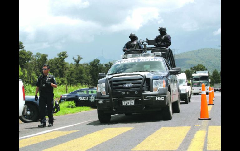 Los agentes arriban al municipio michoacano, donde se han suscitado desapariciones y asesinatos de comuneros. EL UNIVERSAL  /