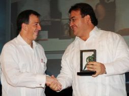 El secretario de Hacienda, José Antonio Meade y el gobernador de Veracruz, Javier Duarte de Ochoa, durante un evento. ARCHIVO  /