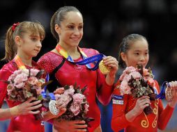 Las favoritas de la gimnasia femenil son: Jordyn Wiebber de EU (c), Victoria Komova de Rusia (i) y la china Yao Jinnan (d). ARCHIVO  /