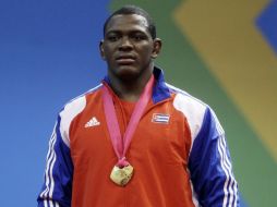 El gigante Mijaín López, de Cuba, cuando ganó el oro en los panamericanos de Guadalajara 2011. ARCHIVO  /