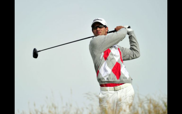 Adam Scott tira en la tercera ronda del día. AFP  /