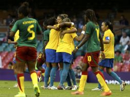 Cristiane festeja el cuarto gol brasileño con sus compañeras. REUTERS  /