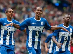 Jerry Bengston (centro) marcó los dos goles de los catrachos. AP  /