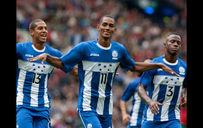 Jerry Bengston (centro) marcó los dos goles de los catrachos. AP  /