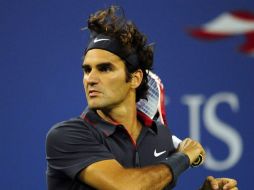 Federer ganó el Abierto británico en el césped del mismo escenario. ARCHIVO  /