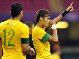 Neymar celebra uno de sus goles con Brasil. AFP  /