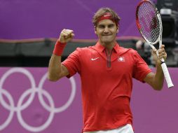 El número uno del mundo celebra tras un difícil partido ante un aguerrido Alejandro Falla. AP  /