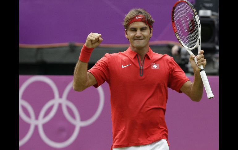 El número uno del mundo celebra tras un difícil partido ante un aguerrido Alejandro Falla. AP  /