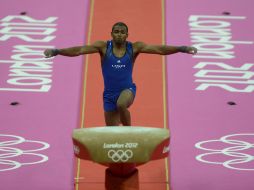 El gimnasta estadounidense John Orozco durante la prueba de salto en la competición de gimnasia masculina. EFE  /