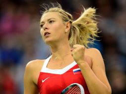 La campeona de Roland Garros 2012 festeja su triunfo. AFP  /