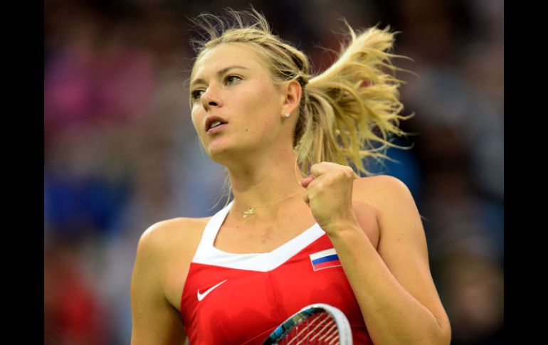 La campeona de Roland Garros 2012 festeja su triunfo. AFP  /