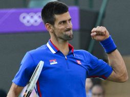 El tenista serbio Novak Djokovic celebra su repunte ante el tenista ibérico. AFP  /