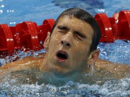 Michael Phelps ya tiene una plata en Londres 2012, y 17 medallas totales en su carrera. EFE  /