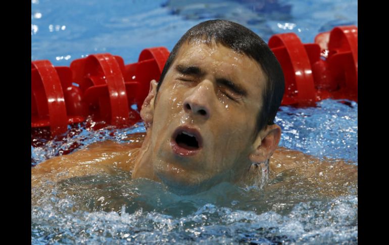 Michael Phelps ya tiene una plata en Londres 2012, y 17 medallas totales en su carrera. EFE  /