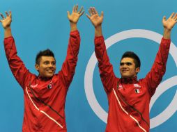 Iván García (d) y Germán Sánchez (i) obtuvieron esta mañana la primera medalla para México en Londres 2012. AFP  /