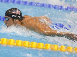 Phelps explicó que cambiará su estrategia para la final del martes. EFE  /