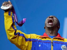 En la tercera olimpiada a la que asiste, Óscar Figueroa celebra su medalla de plata. REUTERS  /