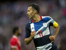 Ryan Giggs encabeza al anfitrión Gran Bretaña, que debe ganarle a los charrúas para mantener el sueño del oro. AFP  /