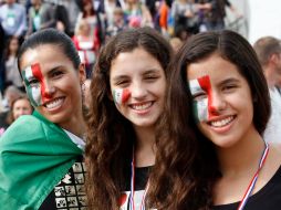 Aficionadas celebran el triunfo de las clavadistas mexicanas Alejandra Orozco y Paola Espinosa. NTX  /