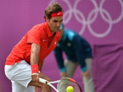 Roger Federer mantiene sus aspiraciones en Londres 2012. AFP  /