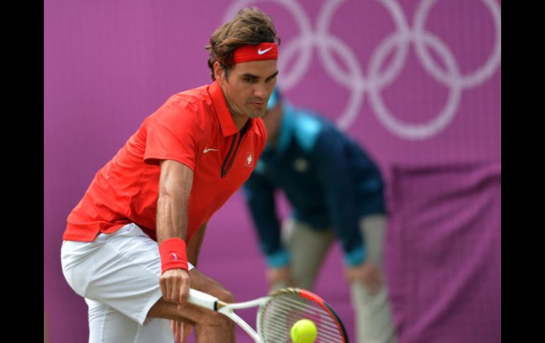 Roger Federer mantiene sus aspiraciones en Londres 2012. AFP  /