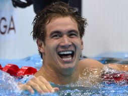 Nathan Adrian se muestra entre emocionado e incrédulo luego de ganar una de las pruebas más rápidas de la natación. AFP  /