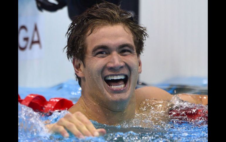 Nathan Adrian se muestra entre emocionado e incrédulo luego de ganar una de las pruebas más rápidas de la natación. AFP  /